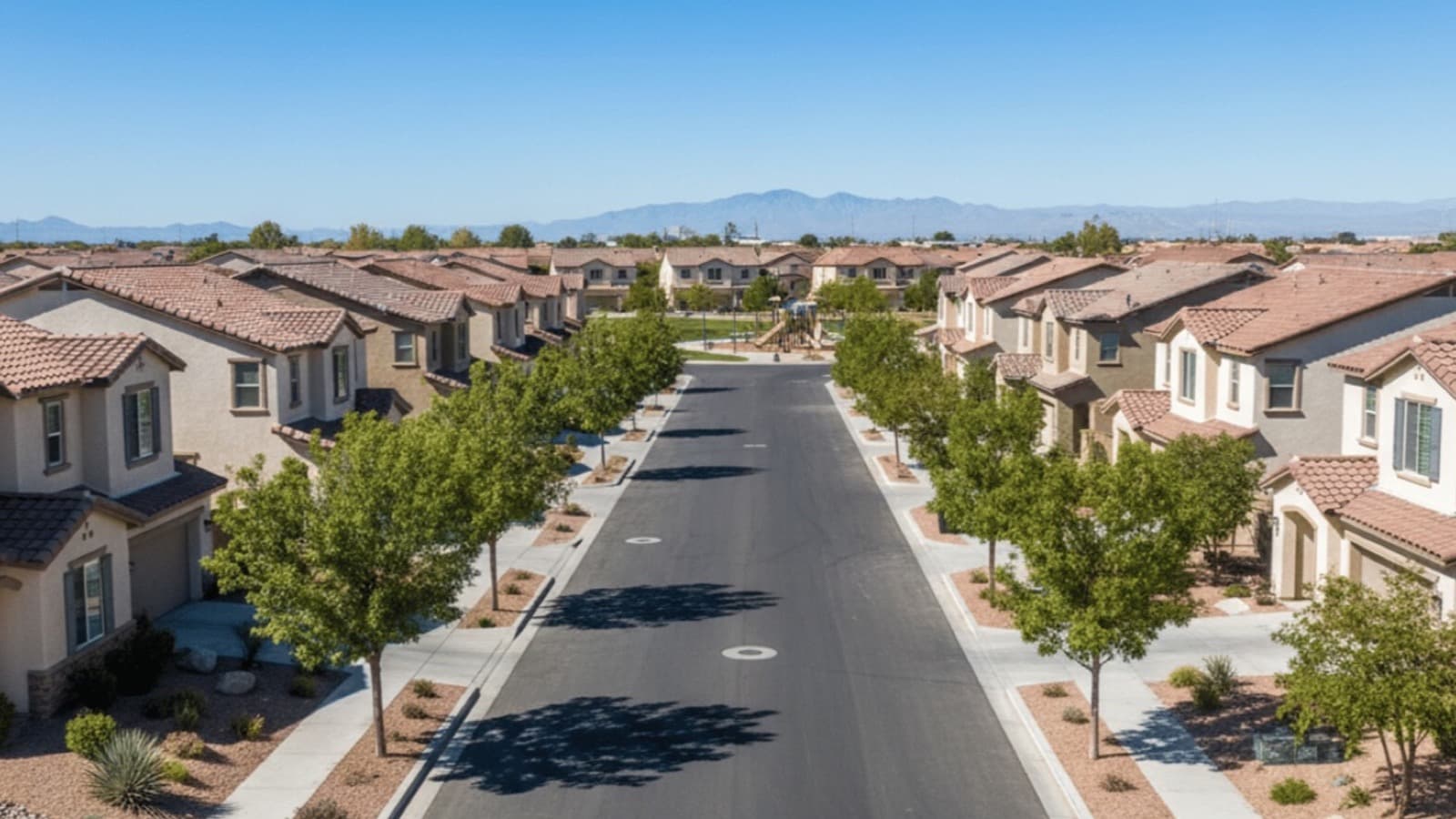Las Vegas Strip skyline at dusk compared with Henderson master-planned community — Las Vegas vs Henderson 2026 buyer guide
